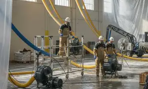 Structural drying technician restoring a Palmdale, CA home after water damage